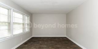 Updated Bungalow with Massive Deck and Fully Fenced Yard! Gallery 5