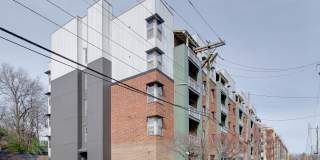 Beautifully updated and clean top floor studio minutes from uptown and historic Wesley Heights neighborhood. Beautifully updated and clean top floor studio minutes from uptown and historic Wesley Heights neighborhood. Gallery 1