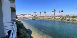 Riverfront 2BR 2BA Furnished Condo on GROUND LEVEL W/Garage and UTILITIES Included AVAIL 4/1/26 Gallery 1