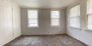 Fall into this cozy 3-Bedroom Home with a fenced in yard & detached garage! Gallery 3