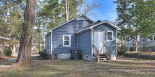 2 Bed/1 Bath just minutes from Augusta University and Surrey Center, featuring granite countertops, stainless steel appliances, and a private yard. Gallery 6