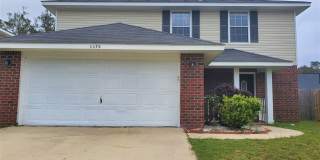 Centrally Located 3/2.5 | Fenced Yard + Loft + Garage Gallery 1
