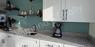 Stunning 3_Bed Home with Two Primary Suites & a Pool! Gallery 11