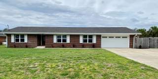 Expansive Waterfront 3Bed/2Ba Entertainer's Dream in Lynn Haven! *SPECIAL: 1/2 OFF 1st Month for New Lease by 12/31/26!* + *Military Incentive!* Gallery 1