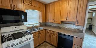 Charming 3 Bedroom Home With Fireplace and 2-Car Garage in Moline! Gallery 3