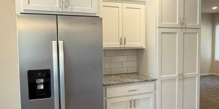 Ranch townhome with 2 stall garage. Spacious 2 bedrooms with walk in closets, 2.5 bathroom, 1st floor laundry Gallery 8