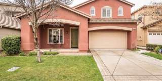 Located in The Lakes, 24 hour gated community, this property has 4 bedrooms, 3.5 Baths and a large loft! Gallery 1