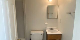 A charming two bedroom one and one half  bath row house located just off New Jersey Ave in the Shaw Neighborhood! Gallery 15