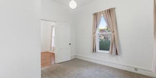 Charming house for rent, with laundry machines included and fenced yard. Gallery 9