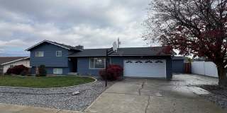 SPACIOUS 4 bed/2 bath home in desired location with double garage, fenced back yard! Gallery 1