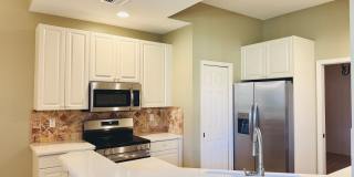 Experience Bell Tower Park. GATED ground floor 2 Bed 2 Bath Den 1 Car Garage Condo. Gallery 18