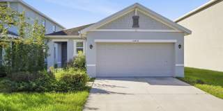3 Bedroom / 2 Bath Home with a Fully Fenced Yard and Screened Lanai Located within the Waverly Village Community! Gallery 1