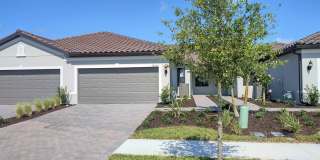 This Gorgeous Villa is located in the desirable new community of Talon Preserve. Gallery 1