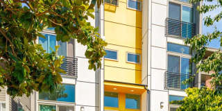 Eastlake Townhome with Rooftop Deck, Views & Dedicated Parking, 2 Bed + Office, 2 Bath Gallery 1
