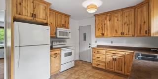 4-bedroom, 2-bathroom rambler nestled in the neighborhood of Baxter. Gallery 1