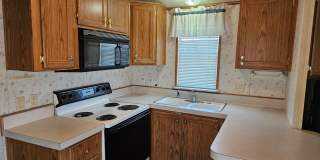 Cute Park Model for rent in a lively 55+ Park! Gallery 9