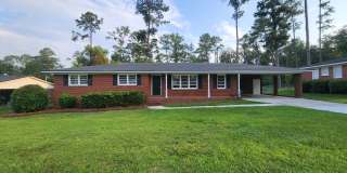 Spacious 3 Bedroom Brick Home with Open Floor Plan, Large Fenced Yard & Carport in Valdosta Gallery 1