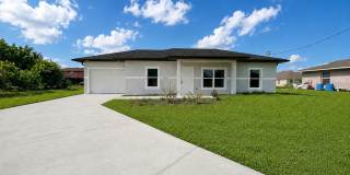 BRAND NEW MODERN SF HOME 3BD+den/2BA with GARAGE IN LEHIGH ACRES! Gallery 1