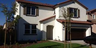 STUNNING 5 BEDROOM, 3 BATHROOM HOME WITH UPDATED KITCHEN AND BATHS! STAINLESS APPLIANCES AND GRANITE COUNTERS! GUEST BEDROOM AND BATHROOM DOWNSTAIRS! Gallery 1