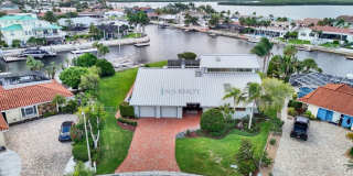 Experience exceptional waterfront living in this stunning 5-bed, 3-full-bath, 2-half-bath home boasting nearly 5,000sf of luxurious living space. Gallery 1