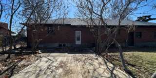Bi-Level House w/ Massive Backyard, Storage, & Character! Gallery 26