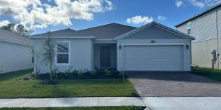 New Construction 4/3 in the beautiful Gated/Guarded Golf Community of Providence in Davenport! Gallery 1