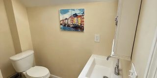 No Fee Single Family House with 5 Parking Spaces Included!  Laundry in Unit! Gallery 15