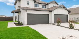 Brand-New 3-Bedroom Emma Park Townhome with Private Yard & 2-Car Garage Gallery 1