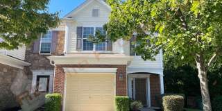 Welcome to this 3-bedroom, 2.5-bathroom, 1-car garage end-unit townhome in Davis Village, Cary, Available Now! Gallery 1