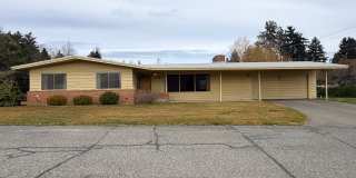 Country like setting! Spacious 3+ bed/ 1.5 bath house with garage, large yard, private deck and ample living space! Landscaping provided! Gallery 1