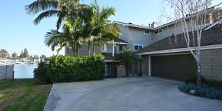 BREATHTAKING LAKE VIEW! Gated Lake community 3 bedroom plus 1 Den 2.5 bath Home Gallery 1