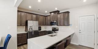 Step into a beautifully designed contemporary residence that exudes style and comfort at every turn. Gallery 12