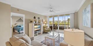 first-floor unit featuring a 2 bedroom, 2 bath fully furnished Gallery 9