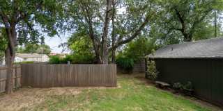 Completely remodeled like new Gingerbread midtown cottage with gleaming hardwoods, converted from a 3/1 to a 3/2. Gallery 46