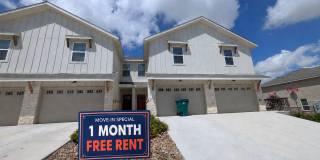 1 MONTH FREE RENT/ 3/2.5/1.5 Fourplex Close to IH35 for Commuters! Fridge, Washer & Dryer Included /NBISD Gallery 1