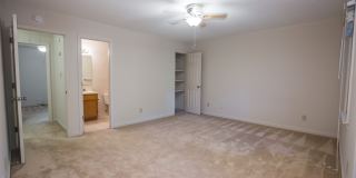 Available early July! Adorable 2 bed, 2.5 bath duplex in American Village Gallery 14