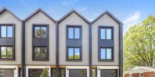 Beautiful 3BR 2.5BA Townhome w/ Full Appliance Kitchen • Garage Parking • Ultra-Modern Gallery 1