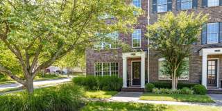 Welcome to this charming end unit townhome Gallery 1