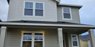 Stunning 4-Bedroom Corner-Lot Home with Expansive Backyard in Reeds Crossing Gallery 1