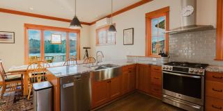 Impeccable Low Bank Bainbridge Waterfront Home with Private Dock Gallery 17