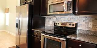 Gorgeous END UNIT 3 bedroom town home in desirable Harpers Mill with Garage and Primary on main with walk-in shower!! Gallery 4