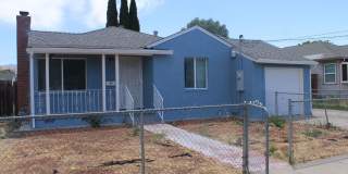 Ready for Move In! Three Bedroom, 1 1/2 Bathroom House with 2 Garages and Side Yard Access in Pittsburg Gallery 1