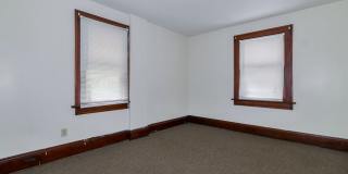 Charming 3BR Home with Classic Woodwork, Porch & Bonus Attic Space Gallery 10