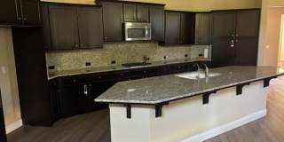 Move-In Ready: Elegant 4-Bedroom Home with Paid Solar in Gated Community Gallery 1