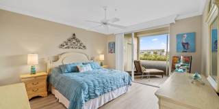 first-floor unit featuring a 2 bedroom, 2 bath fully furnished Gallery 15