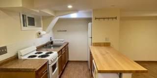 Charming 1928 Row Home for Rent with Modern Amenities — 3 Bedroom 2 Full Bath w/ 2 Half Baths, 2 Kitchens, located in Kingman Park, Near DC Armory & Eastern Market Gallery 57