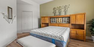 Experience Bell Tower Park. GATED ground floor 2 Bed 2 Bath Den 1 Car Garage Condo. Gallery 21