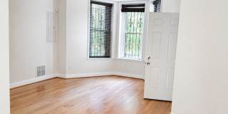 Updated One-Bedroom with In-Unit Laundry and Private Porch Near Shaw Gallery 3