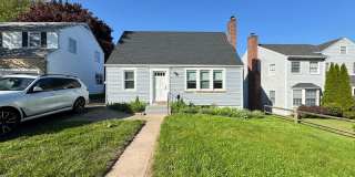 Cape Cod Single Family | Just a Block from the Beach! Gallery 1