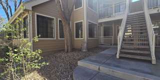 Bright Ground-Floor 2BR/1BA Condo features Garage, Covered Patio  Community Pool Gallery 1
